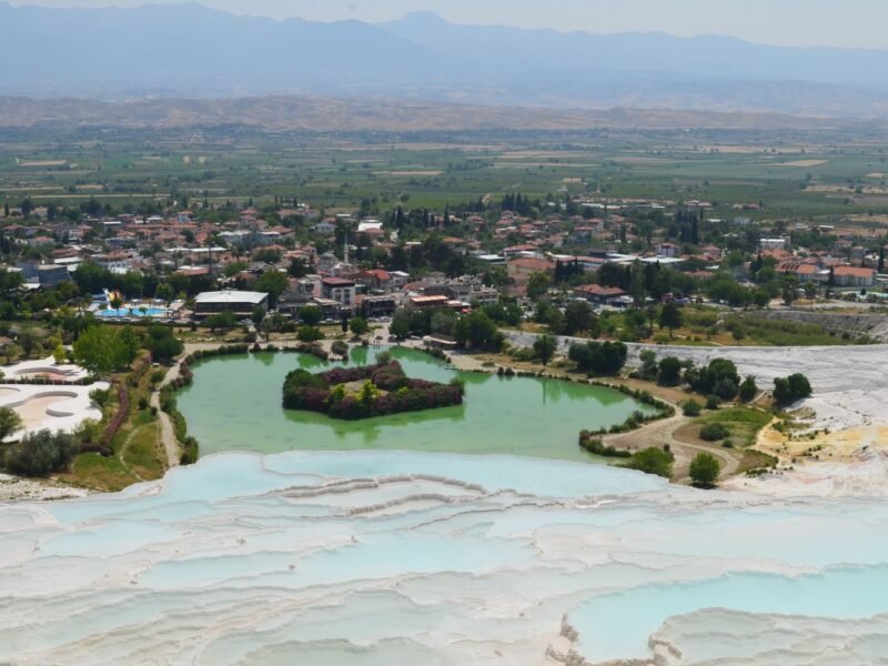 Pamukkale hot air balloon — aerial view of thermal pools and landscape