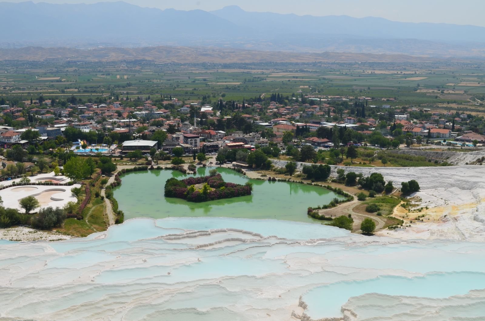Pamukkale hot air balloon — aerial view of thermal pools and landscape
