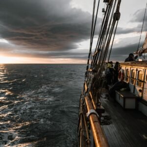Bodrum Blue Cruise — wooden sailing ship at sunset, illustrative